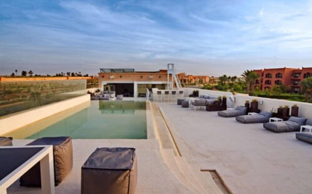 Cesar Resort & Spa Μαρακές Εξωτερικό φωτογραφία The rooftop pool at the hotel